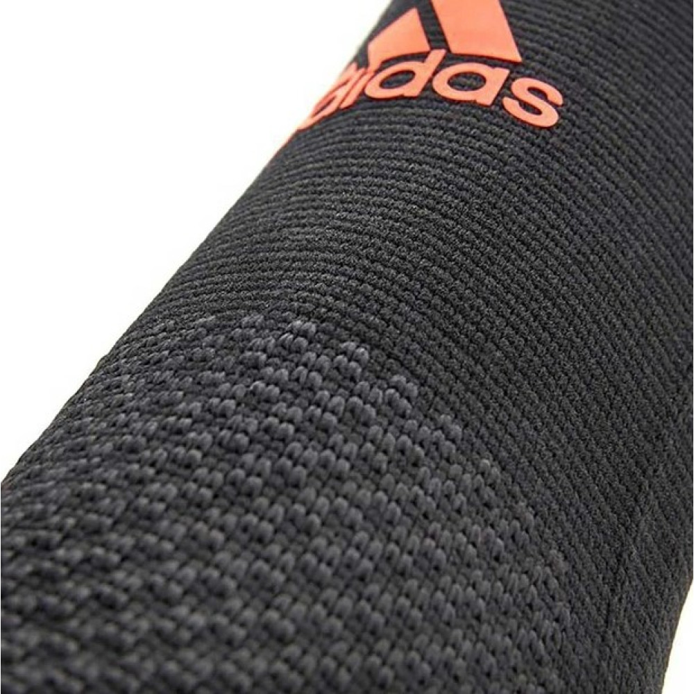 Фіксатор щиколотки Adidas Performance Ankle Support чорний, червоний Уні M ADSU-13312RD
