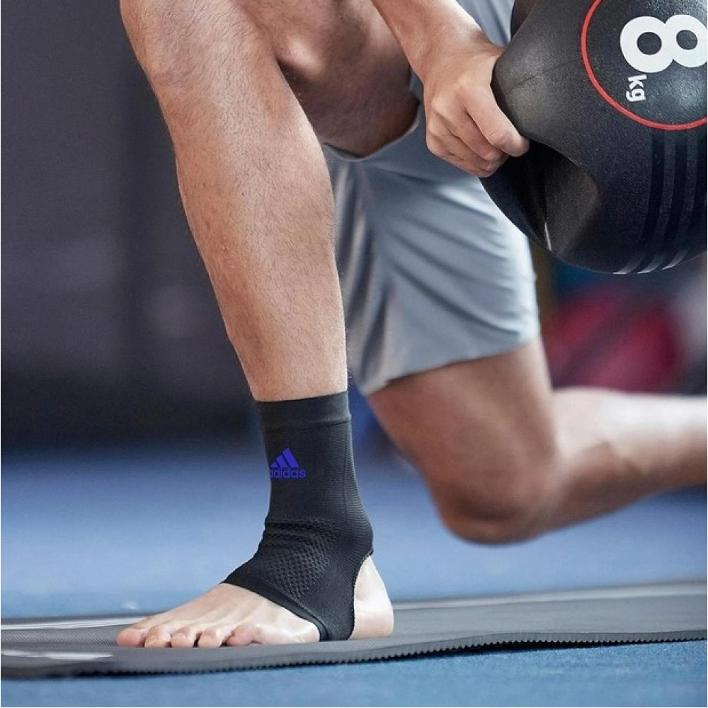 Фіксатор щиколотки Adidas Performance Ankle Support чорний, синій Уні L ADSU-13313BL