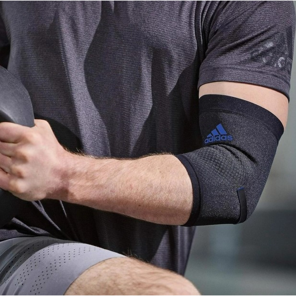 Фіксатор ліктя Adidas Performance Elbow Support чорний, синій Уні S ADSU-13331BL