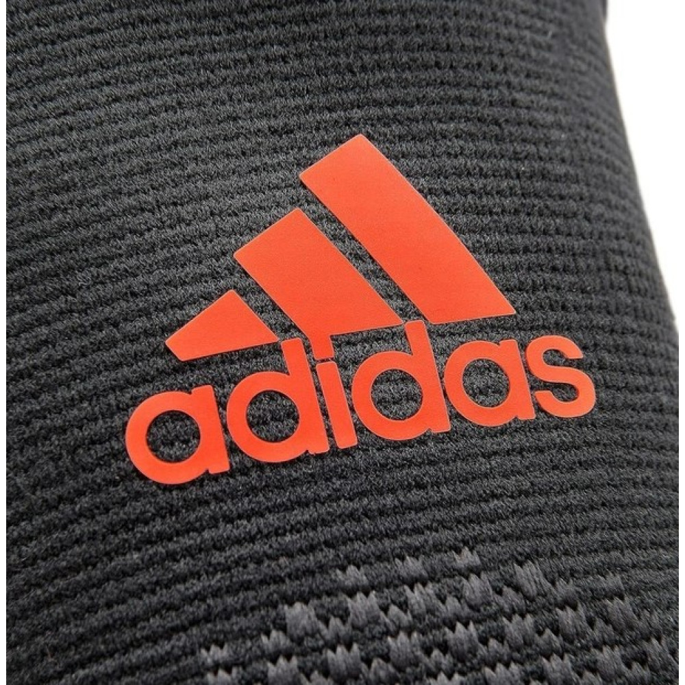 Фіксатор ліктя Adidas Performance Elbow Support чорний, червоний Уні S ADSU-13331RD