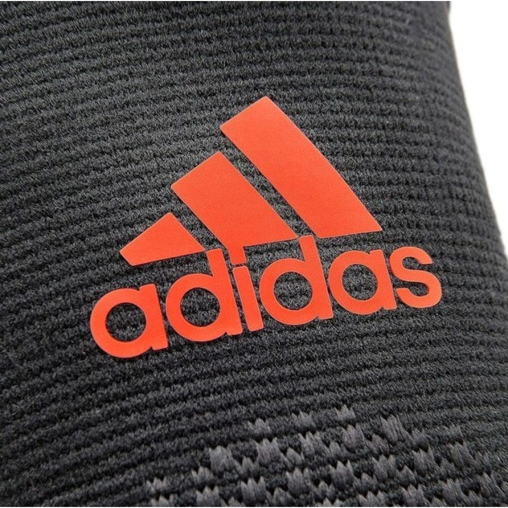 Фіксатор ліктя Adidas Performance Elbow Support чорний, червоний Уні L ADSU-13333RD
