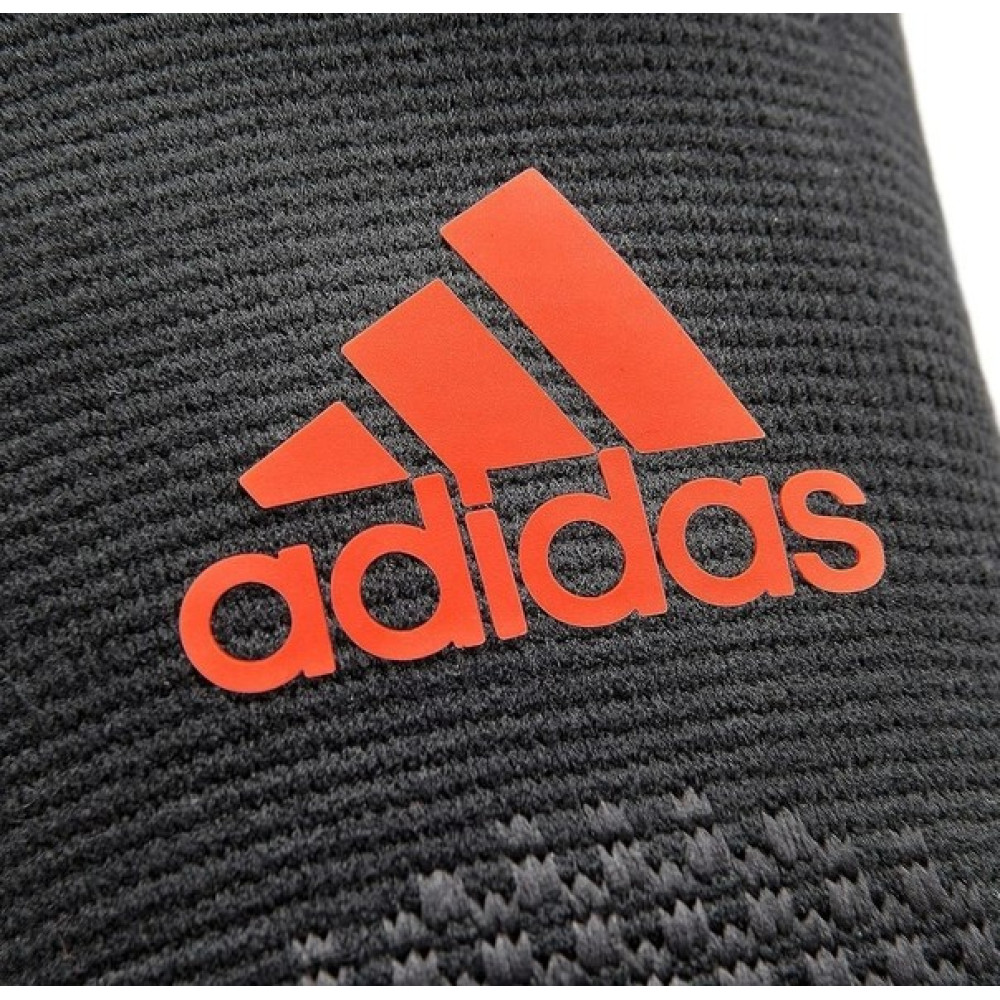 Фіксатор ліктя Adidas Performance Elbow Support чорний, червоний Уні XL ADSU-13334RD